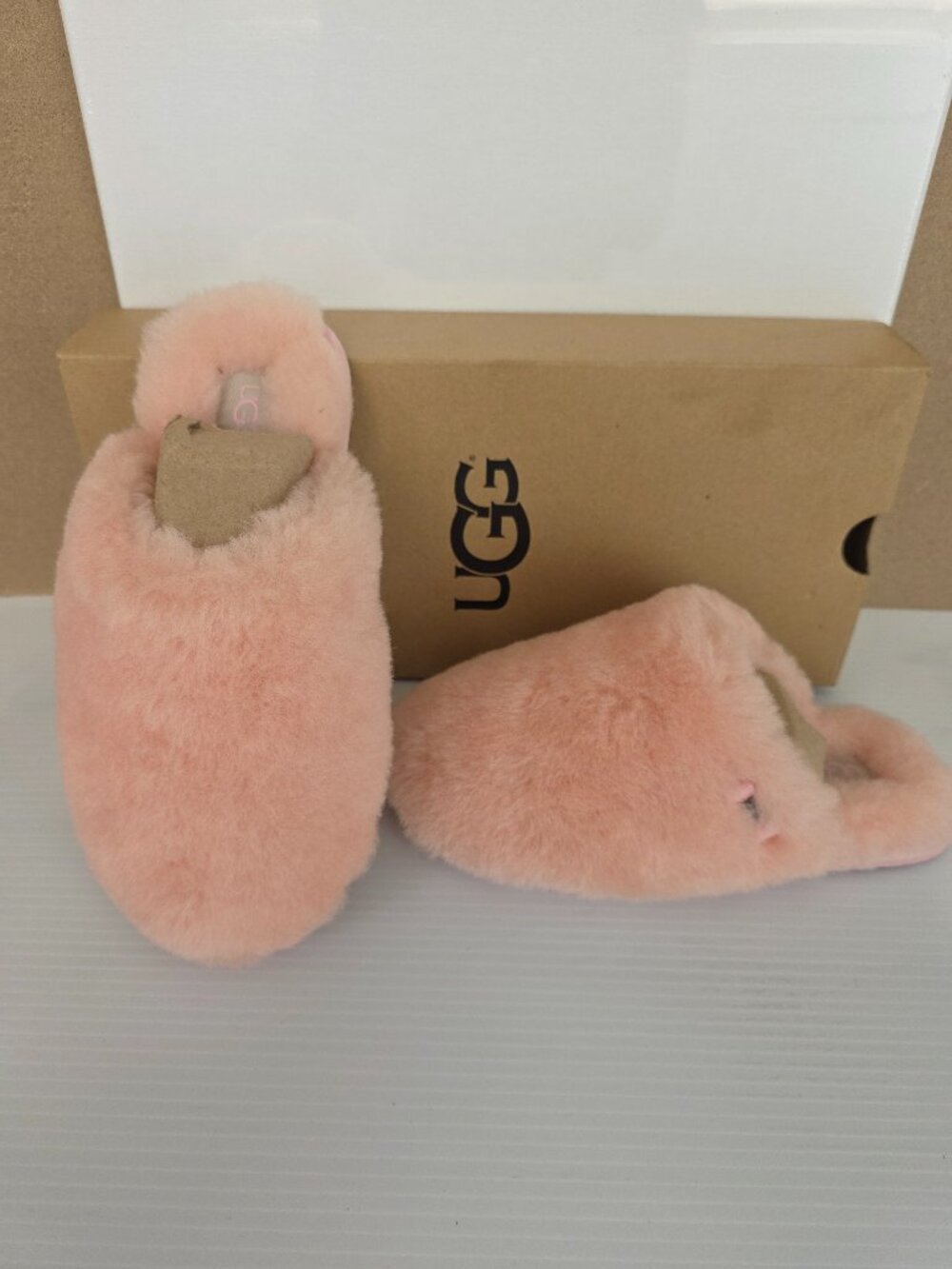 UGGS pink slipper